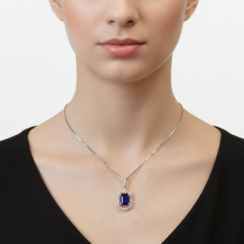 18K White Gold Emerald Cut Blue Sapphire w/ Diamond Halo Pendant